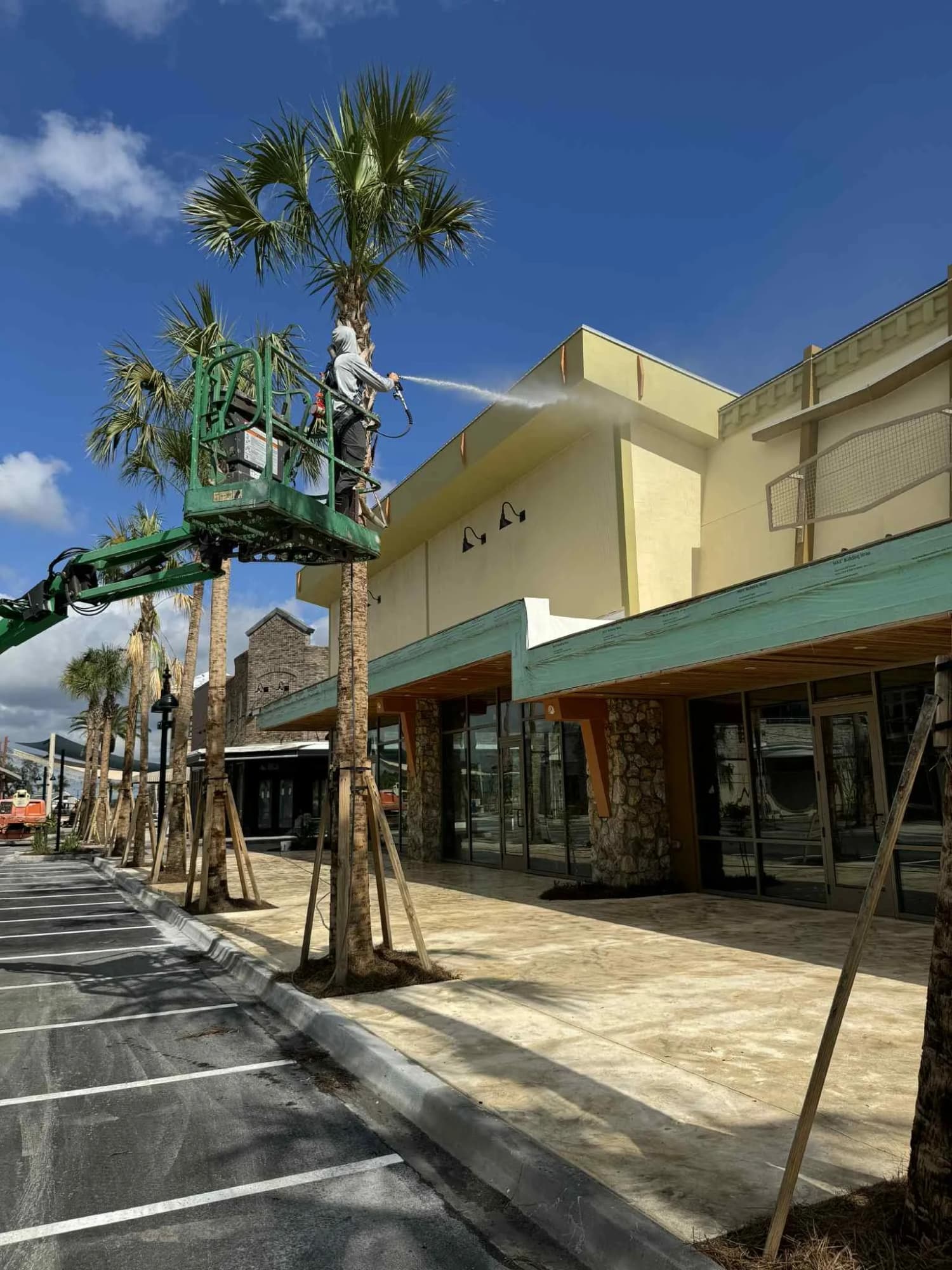 Storefront washing from a boom lift