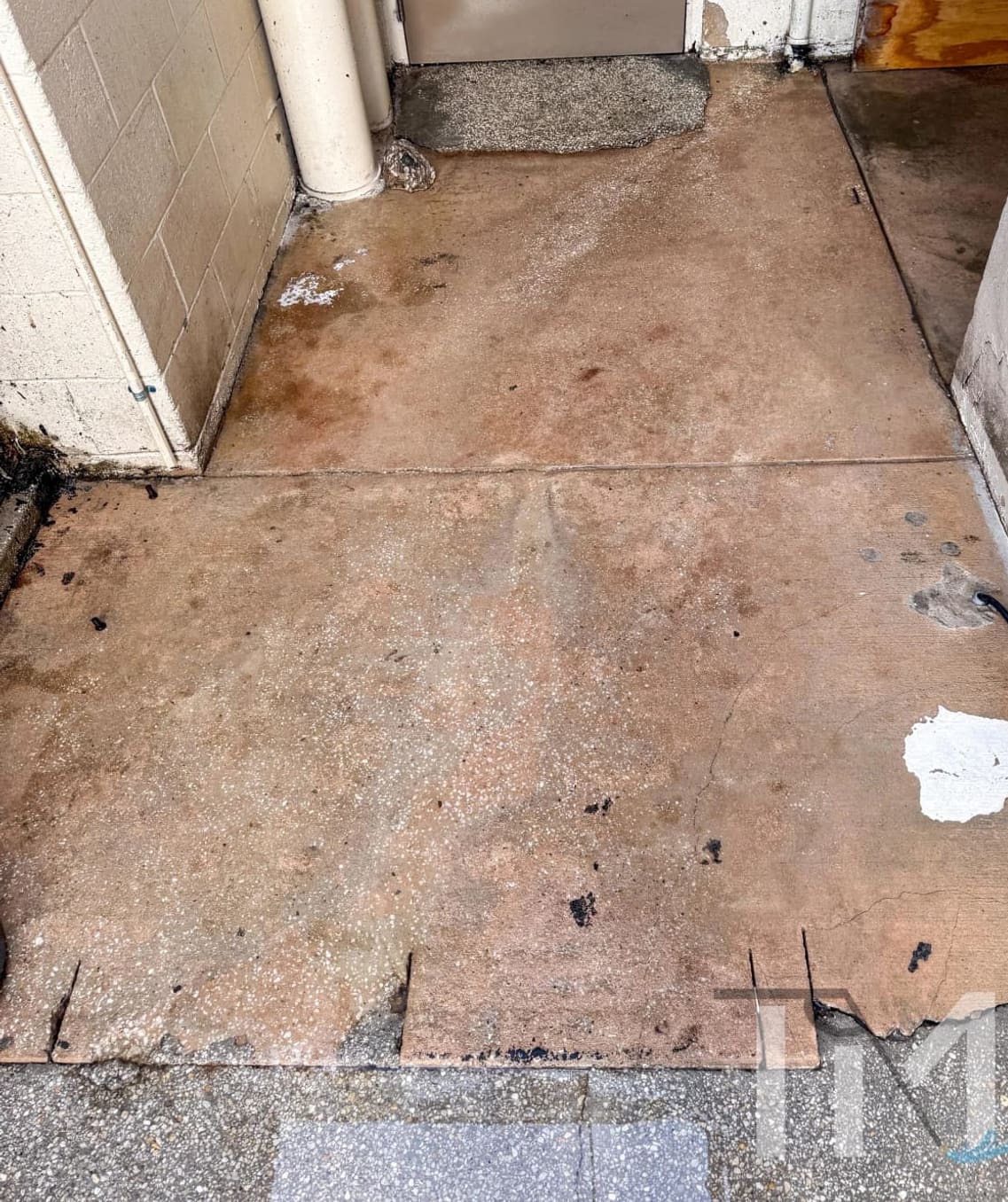 Service entry restored to bare, clean concrete